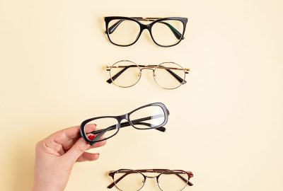 woman-hand-holding-eyeglasses-optical-store-glas-2021-08-30-12-08-32-utc-copy.jpg